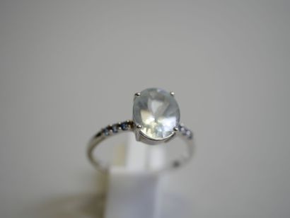 Light blue oval stone** white gold ring with...