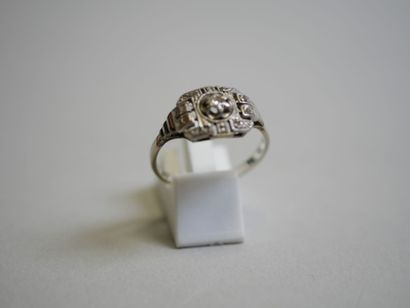 2 gold rings, one in white gold with diamonds...