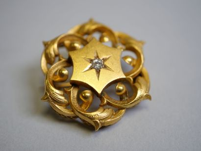 2 gold diamond and pearl brooches*.
C 5.91...