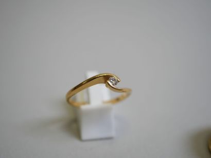 Gold lot: 
Wedding band and diamond ring...