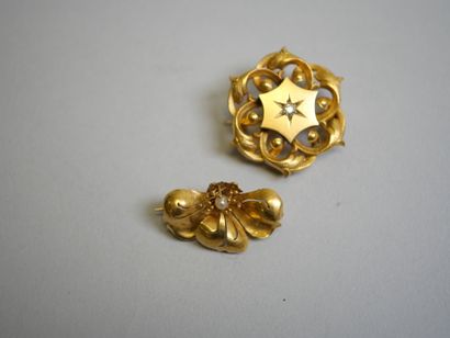 2 gold diamond and pearl brooches*.
C 5.91...