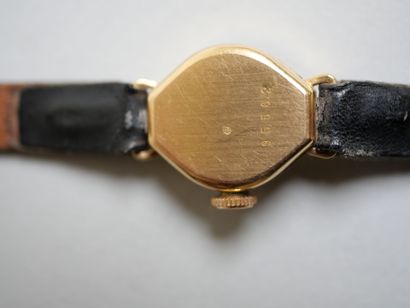 YEMA.
Gold ladies' watch on black bracelet.
C...
