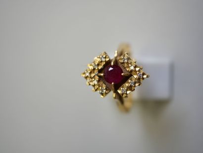Red stone** gold ring with round center TDD...