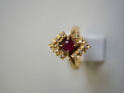 Red stone** gold ring with round center TDD...