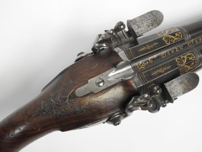 Pistolet à silex à double canon en table,...