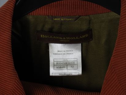 HOLLAND & HOLLAND.
Veste en velours rouge...