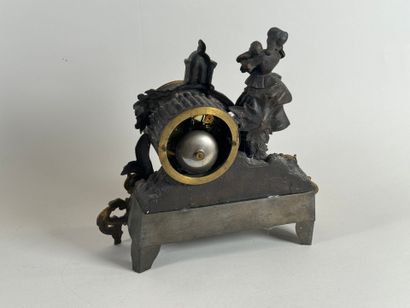 École XXe.
Femme à l'enfant.
Pendule en régule...