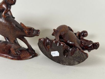 INDOCHINE, XXe.
Paire de sujets en bois sculpté...