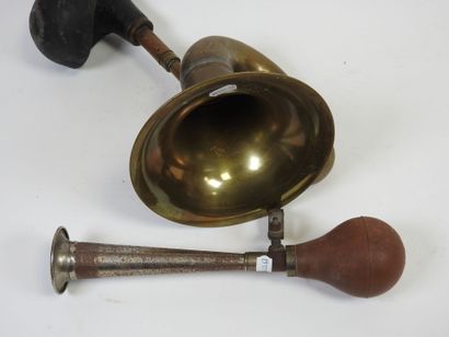 Two metal and copper car horns.
Early 20th...