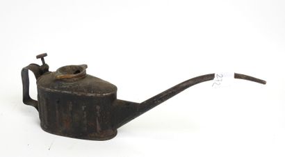 Antique tin oil cruet with long spout.
7...