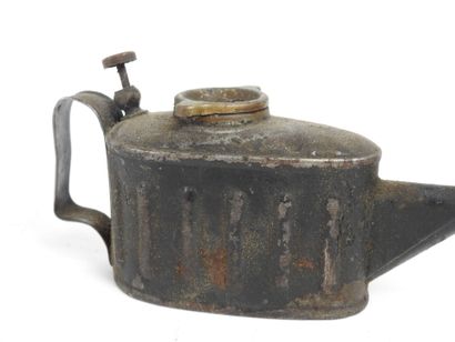 Antique tin oil cruet with long spout.
7...