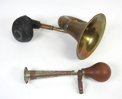 Two metal and copper car horns.
Early 20th...