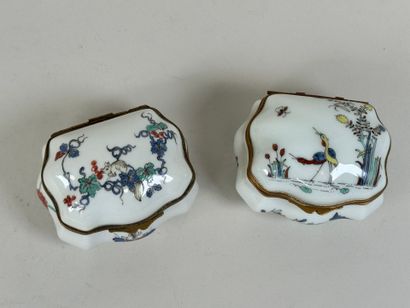 Two polychrome porcelain pillboxes decorated...
