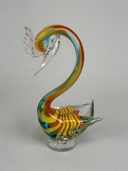 Blown and colored glass subject featuring...