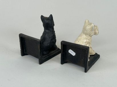 Pair of metal bookends decorated with 