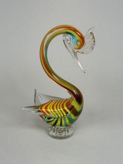 Blown and colored glass subject featuring...
