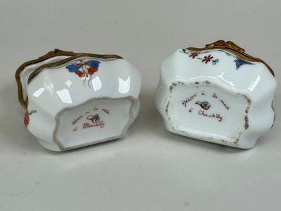 Two polychrome porcelain pillboxes decorated...