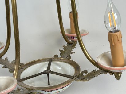Brass four-light chandelier with polychrome...