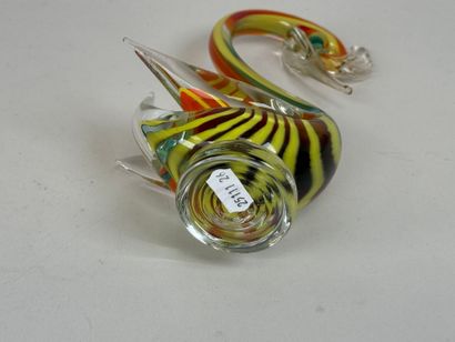 Blown and colored glass subject featuring...