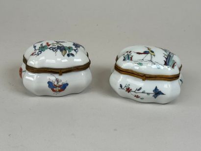 Two polychrome porcelain pillboxes decorated...