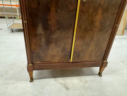 Mahogany veneered cabinet opening with two...