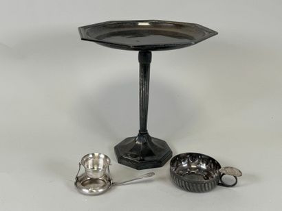 An octagonal bowl on a silver-plated metal...