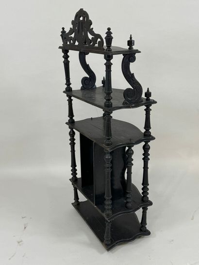 Blackened, openwork and turned wood music...