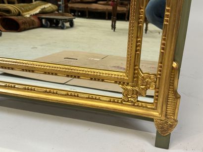 Gilded wood mirror with foliate decoration,...