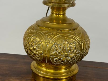 LOB.
Oil lamp in repoussé brass, mounted...
