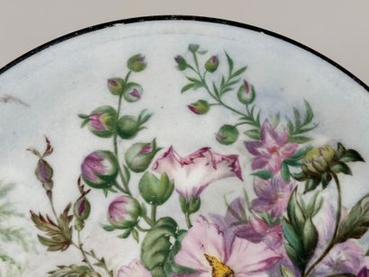 Circular polychrome porcelain dish decorated...
