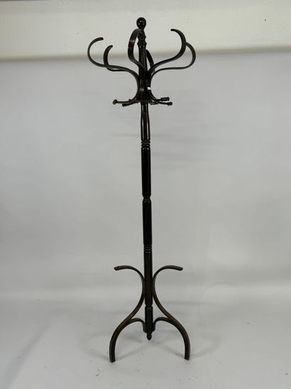 Stained wood coat rack with five pegs.
H....