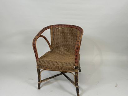 Wood and rattan armchair, X-shaped brace.
70...