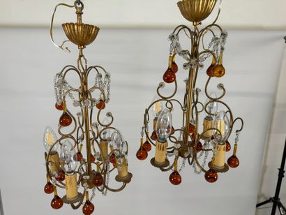 Pair of gilded metal chandeliers with colored...