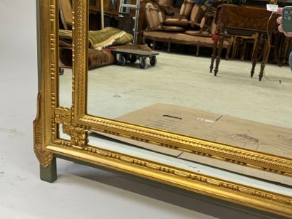 Gilded wood mirror with foliate decoration,...