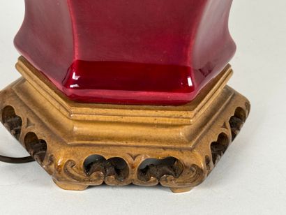 Faceted baluster vase in oxblood color.
Mounted...