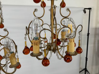 Pair of gilded metal chandeliers with colored...