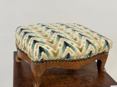 Small wooden footrest with colored fabric...