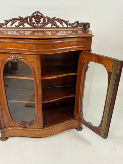 Small curved wooden display cabinet opening...