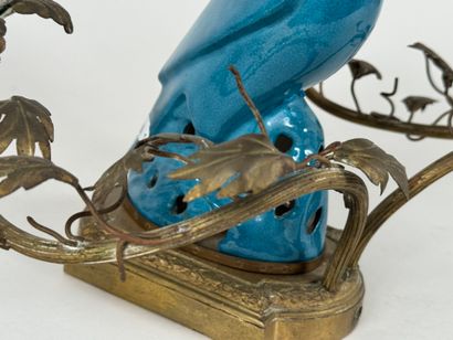 Bronze wall sconce with two light arms, decorated...