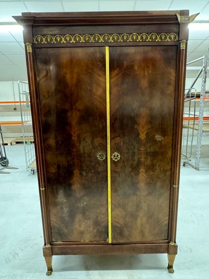 Mahogany veneered cabinet opening with two...