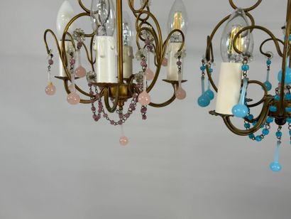 Two gilded metal chandeliers with blue and...