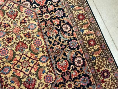Oriental rug in knotted wool decorated with...