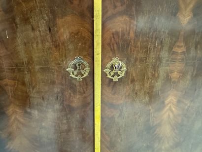 Mahogany veneered cabinet opening with two...