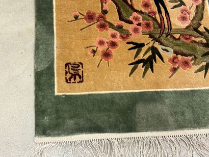 Small silk carpet with polychrome decoration...