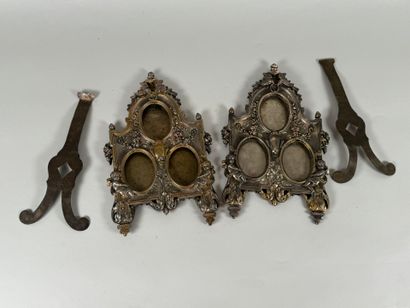 Pair of three-slot picture frames in metal...