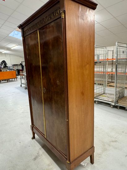 Mahogany veneered cabinet opening with two...