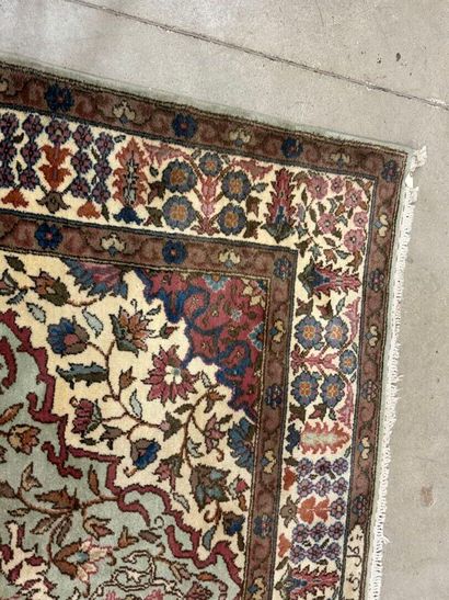 Oriental hand-knotted wool rug decorated...