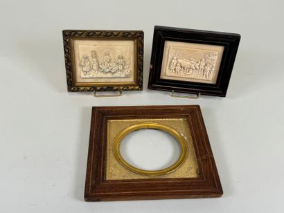 Two petrified limestone plaques decorated...