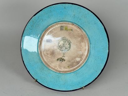 Émaux de LONGWY.
Plat circulaire en faïence...