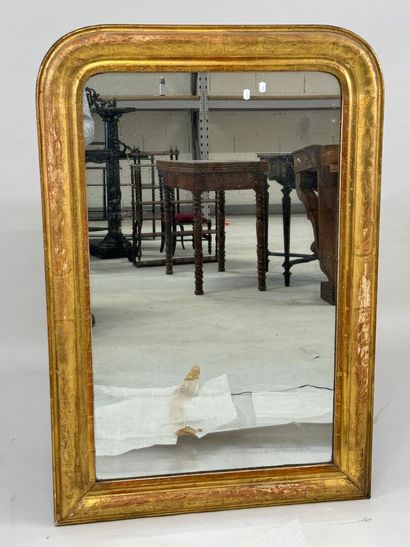 Wood and gilded stucco mirror, the upper...